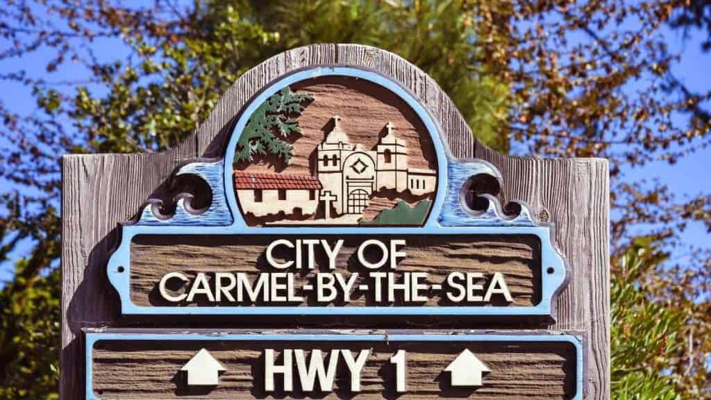 22 Hidden U.S. Towns That Feel Like You Stepped Into Europe 8 Carmel by the Sea California place sign