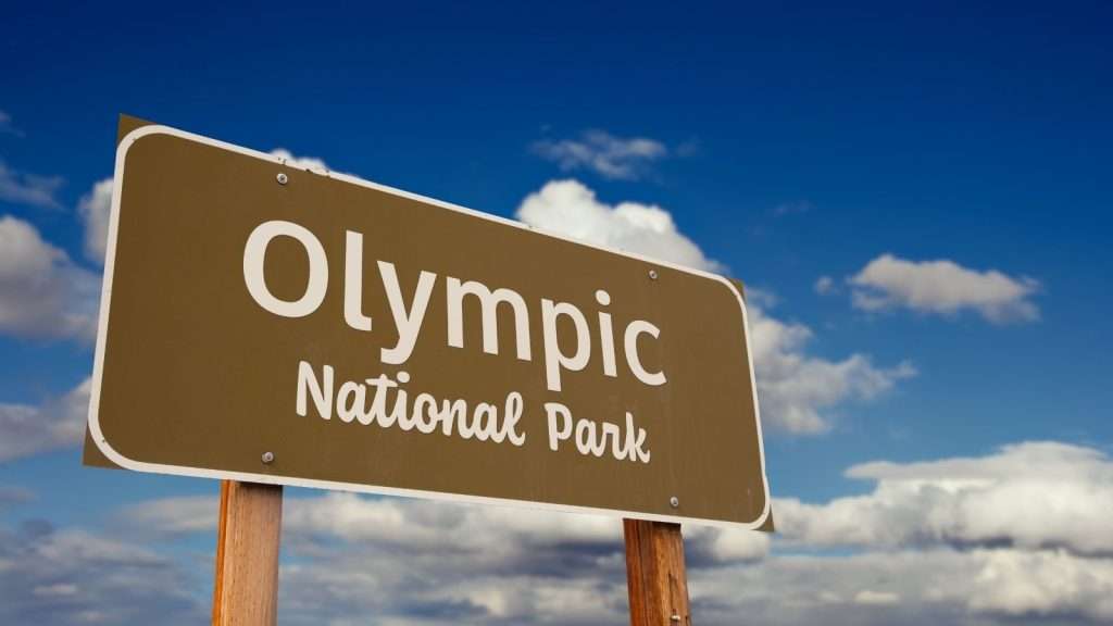 10 U.S. River Towns With Old World Charm That Will Steal Your Heart 4 Olympic National Park Washington sign sky