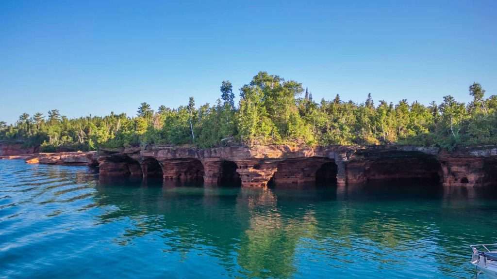 18 Secluded Island Escapes in the U.S. You’ve Probably Never Heard Of 9 Apostle Islands Wisconsin beach insland