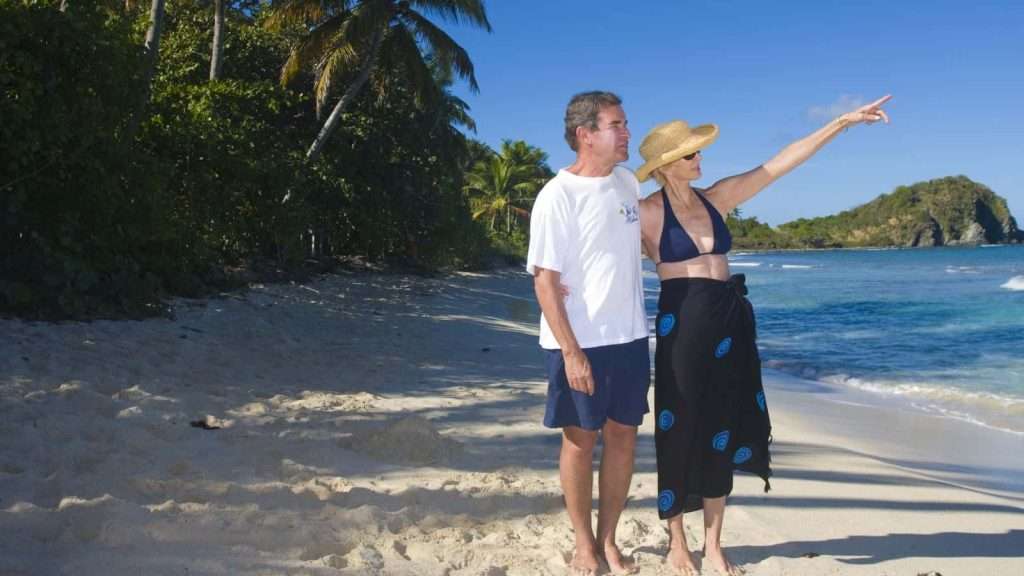 19 Best Group Travel Tours for Older Travelers 19 Peaceful Islands couple old boomer
