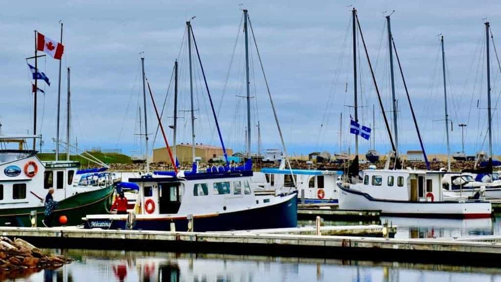 18 Hidden Gems in Canada Where You Can Escape the Modern World 16 The Magdalen Islands Quebec boat