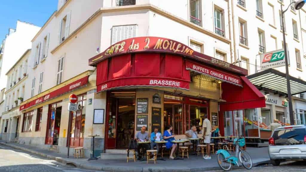 19 Iconic Movie Locations That Are Still Around So You Can Revisit the Glory Days 4 Cafe des Deux Moulins