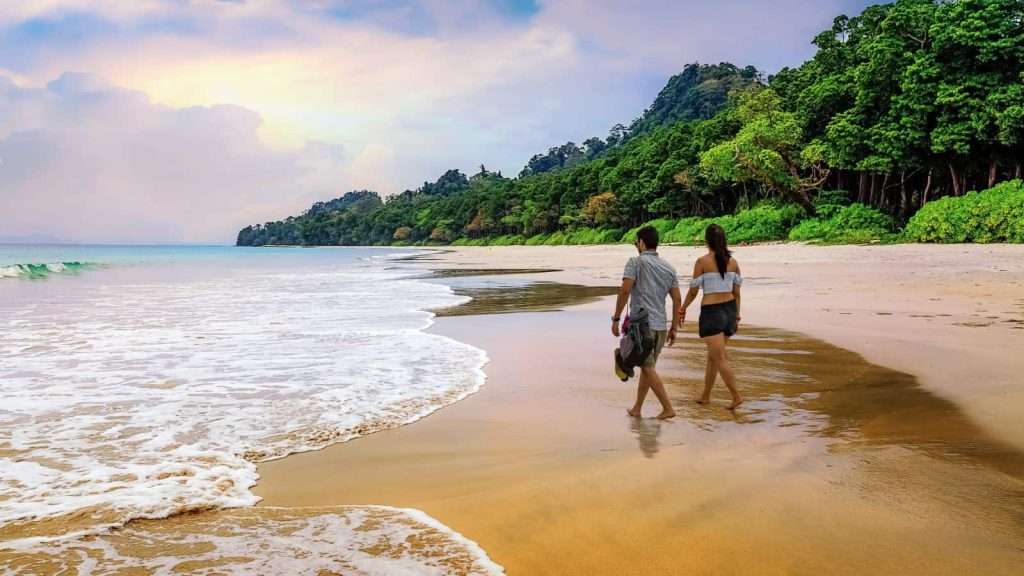 21 Hidden Coastal Getaways That Feel Like the World’s Best-Kept Secrets 6 Havelock Island India couple travel beach
