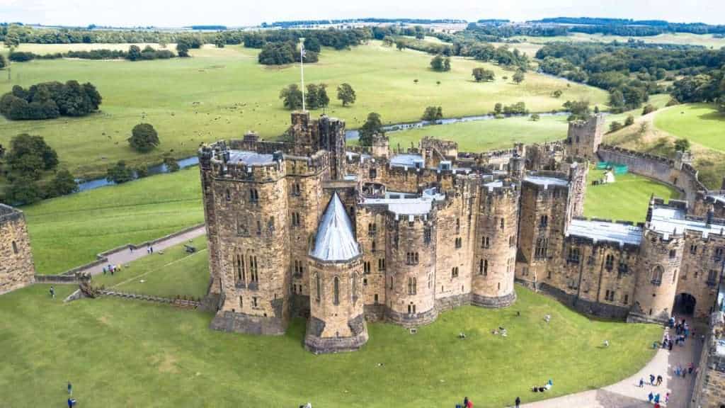 Step Into the Screen: 18 Movie Locations You Can Actually Visit 4 alnwick castle england