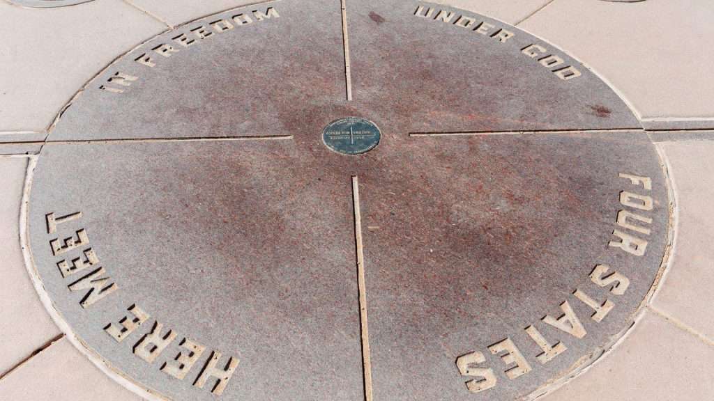 24 American Attractions That Look Like Tourist Traps but Secretly Deserve the Hype 21 four corners monument southwest usa