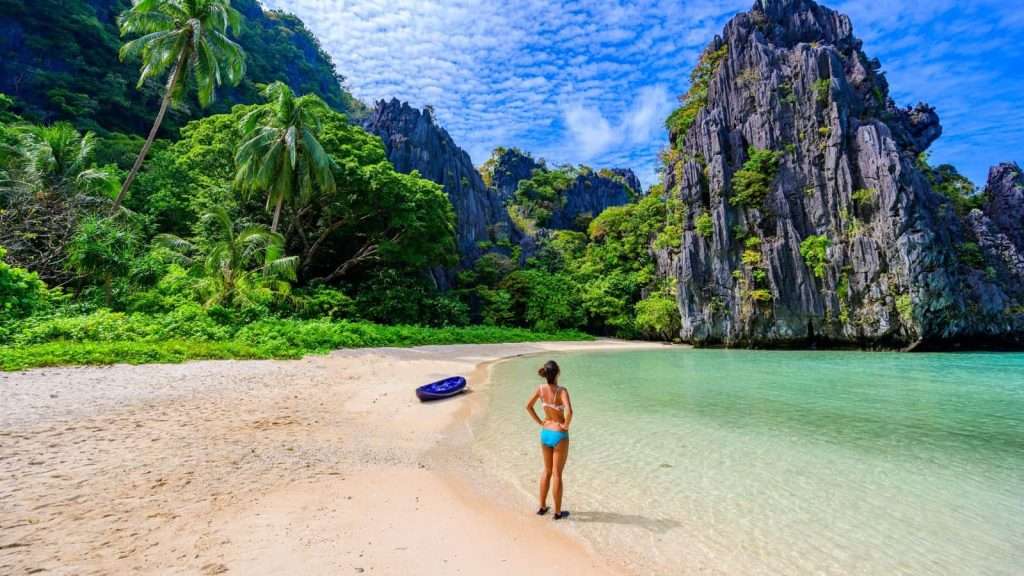 20 Overlooked Travel Destinations That Are Surprisingly Stunning 12 El Nido Palawan Philippines women travels