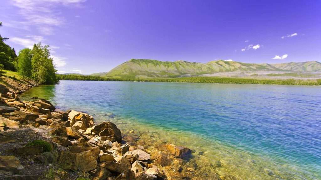 21 Breathtaking Lakes in the U.S. That Aren’t Lake Tahoe 3 Flathead Lake Montana beach