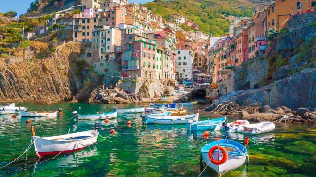 19 Stunning Cliffside Towns You Have to See to Believe 18 Riomaggiore Italy boat