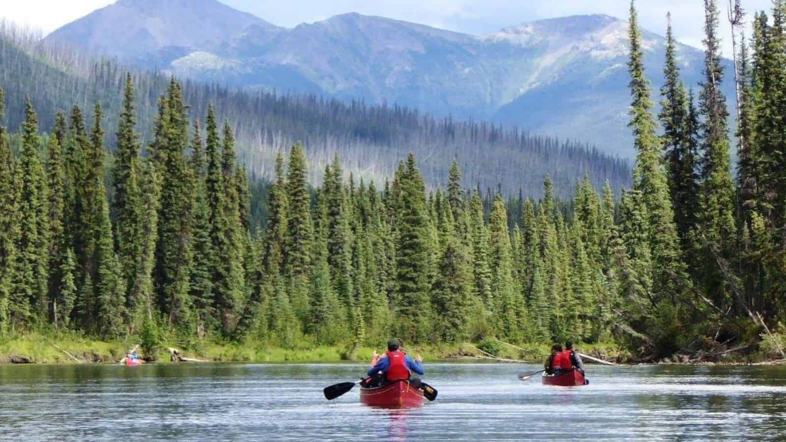 18 Group Tours That Forge Friendships Around the World 18 Canoeing the Yukon River in Canada