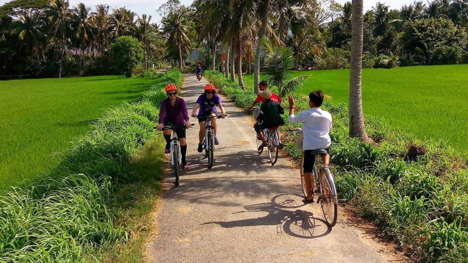 18 Group Tours That Forge Friendships Around the World 7 Cycling Through the Mekong Delta Vietnam