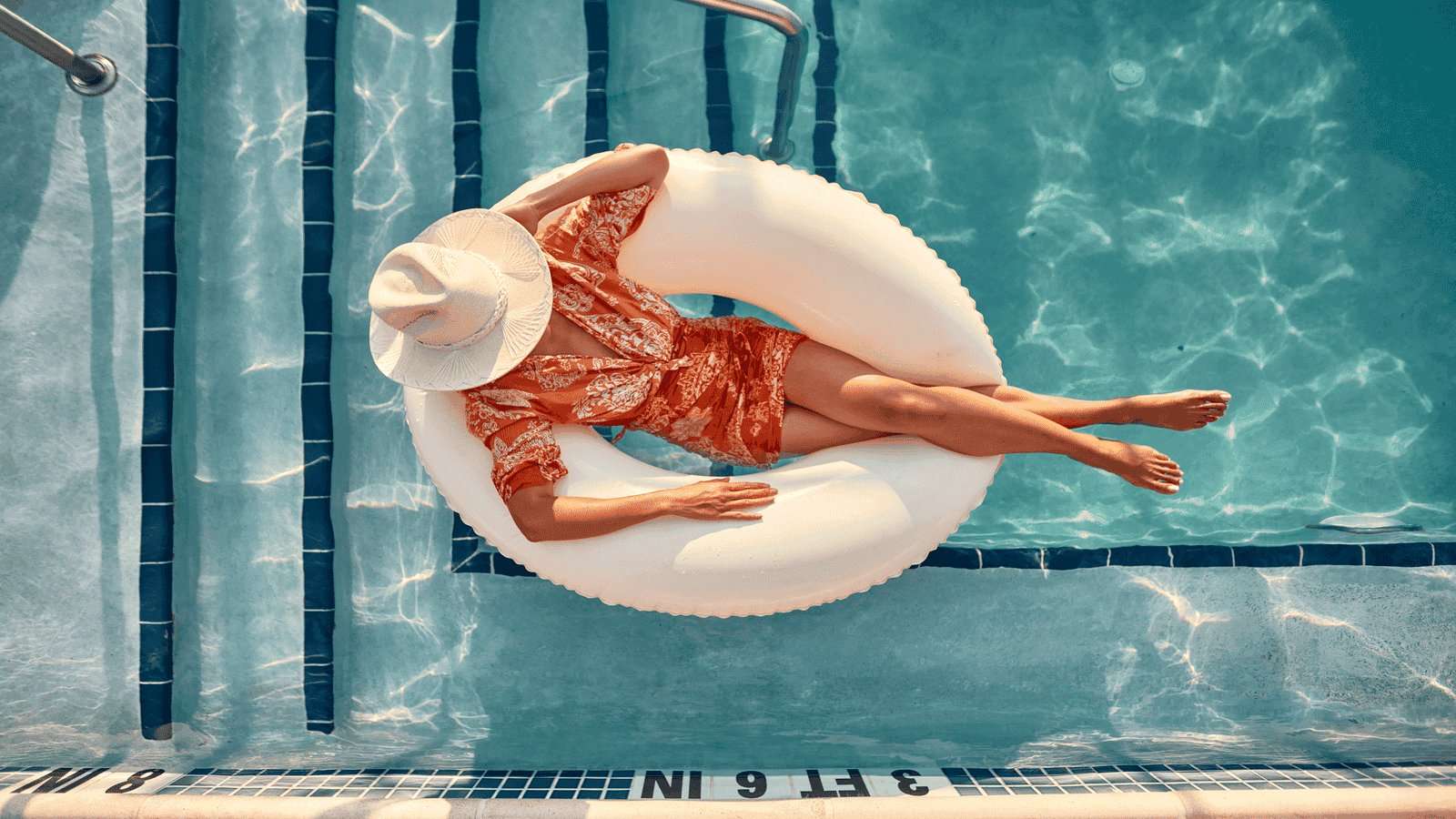 I Thought I Missed My Chance at a Summer Vacation. Then I Discovered These Last-Minute Deals 30 HAAS8997 woman on pool float- virgin hotels_