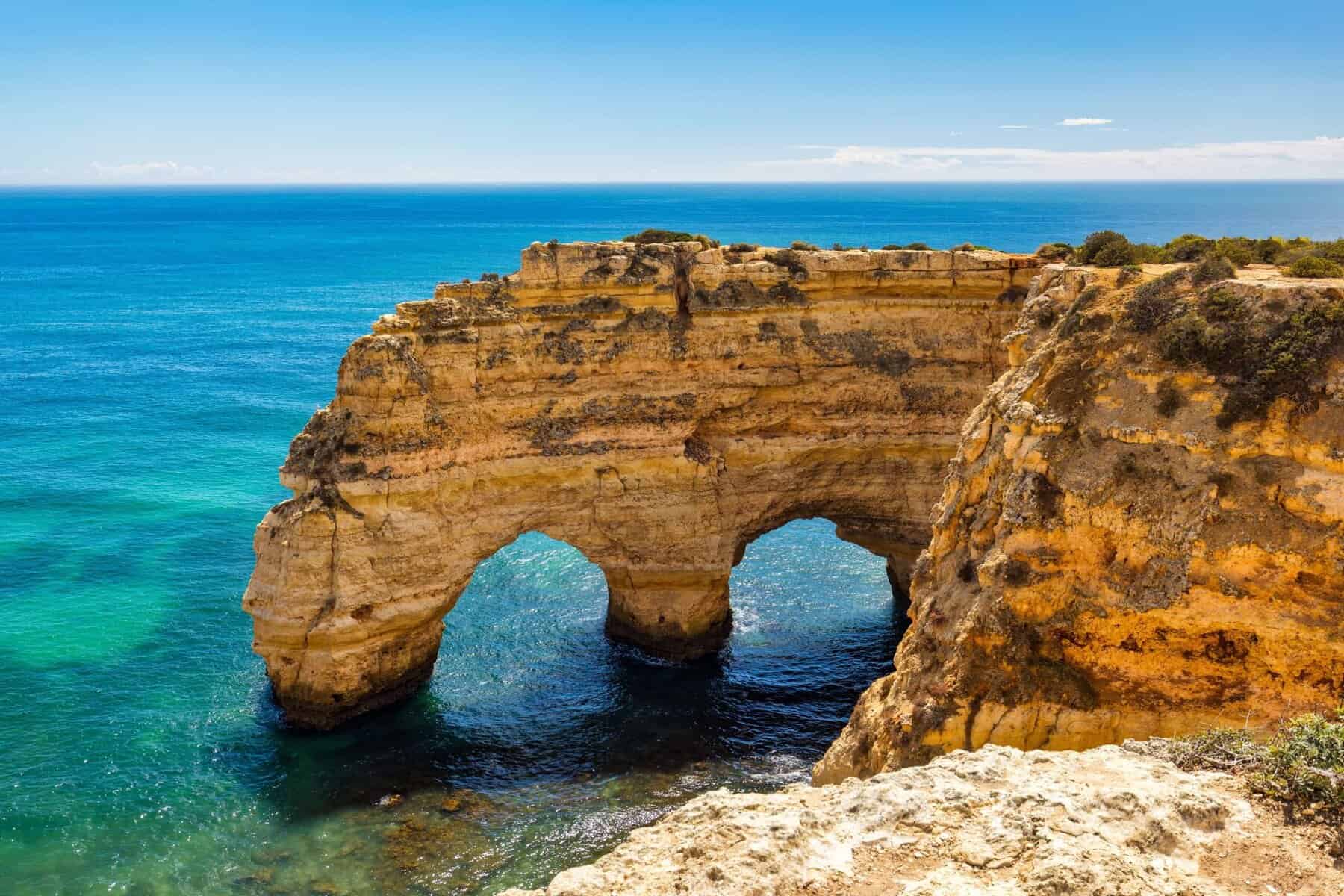 25 Trips That Pay Off Emotionally and Financially 30 Praia,Da,Marinha,,Beautiful,Beach,Marinha,In,Algarve,,Portugal.,Navy