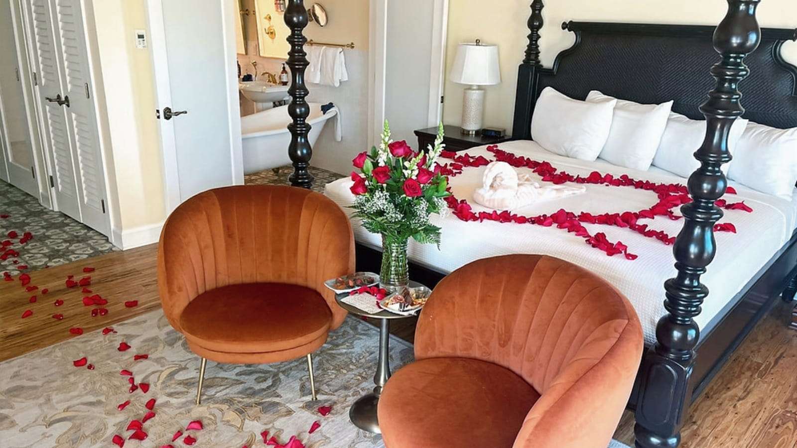 Romantic Destinations Perfect for a Last‑Minute Valentine’s Getaway 12 Grassy Flats Resort and Beach Club room with flowers on bed