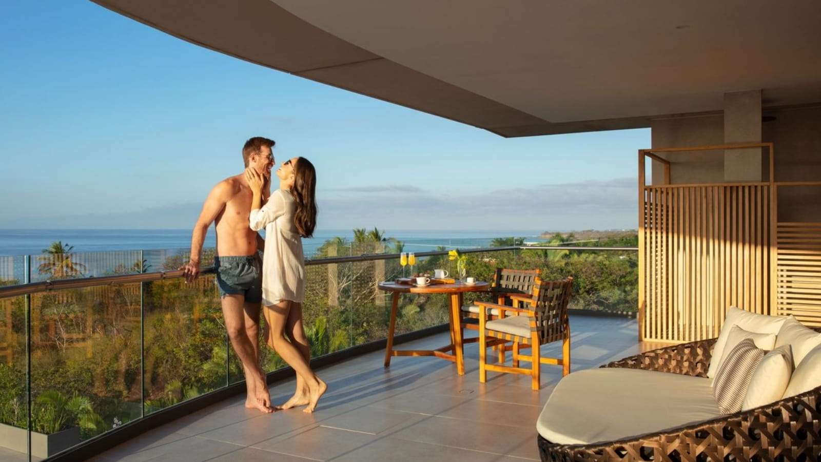Romantic Destinations Perfect for a Last‑Minute Valentine’s Getaway 3 Secrets Bahia Mita Surf Spa Resort couple on balcony