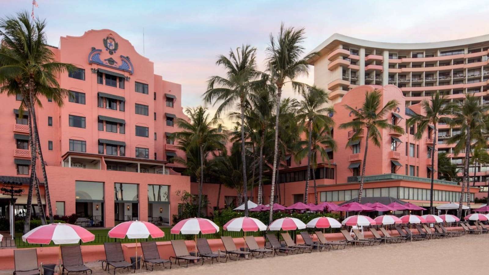 Romantic Destinations Perfect for a Last‑Minute Valentine’s Getaway 8 The Royal Hawaiian Waikiki lc hnllc beach umbrellas 16402 Feature Hor 1