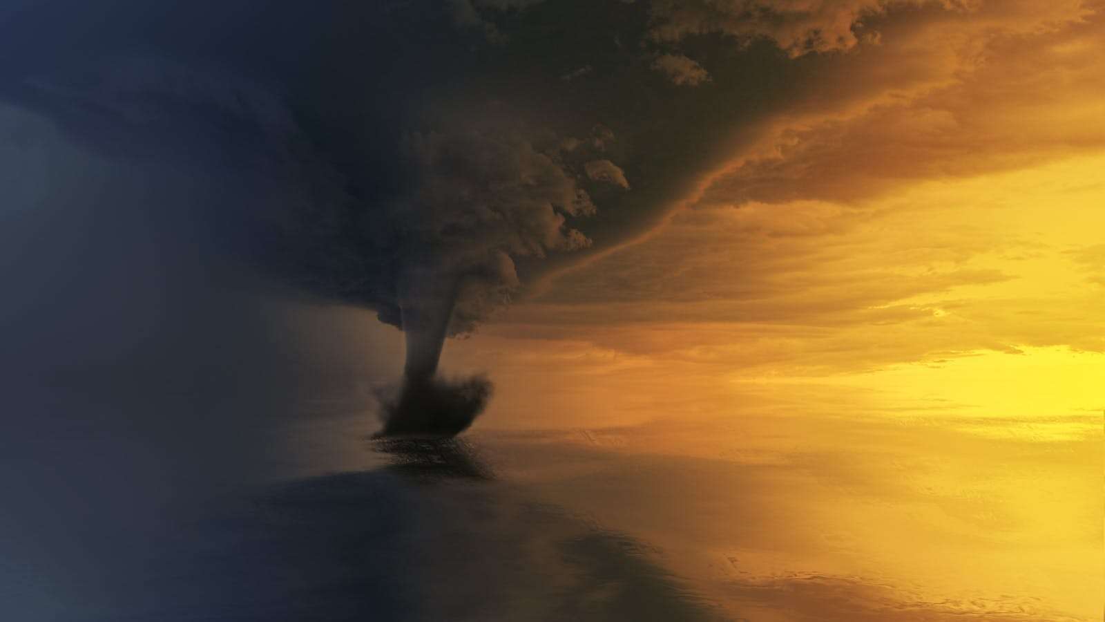 20 American Disaster Towns Forever Marked by One Terrifying Day 5 A powerful tornado over the ocean during a dramatic sunset, capturing the storm's intensity and beauty.