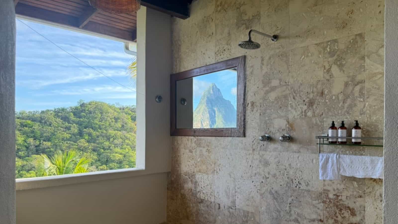 When the Family Travel Plans Fell Apart, We Found Exactly What We Needed 6 View of Pitons Anse Chastanet hotel room open air from open shower